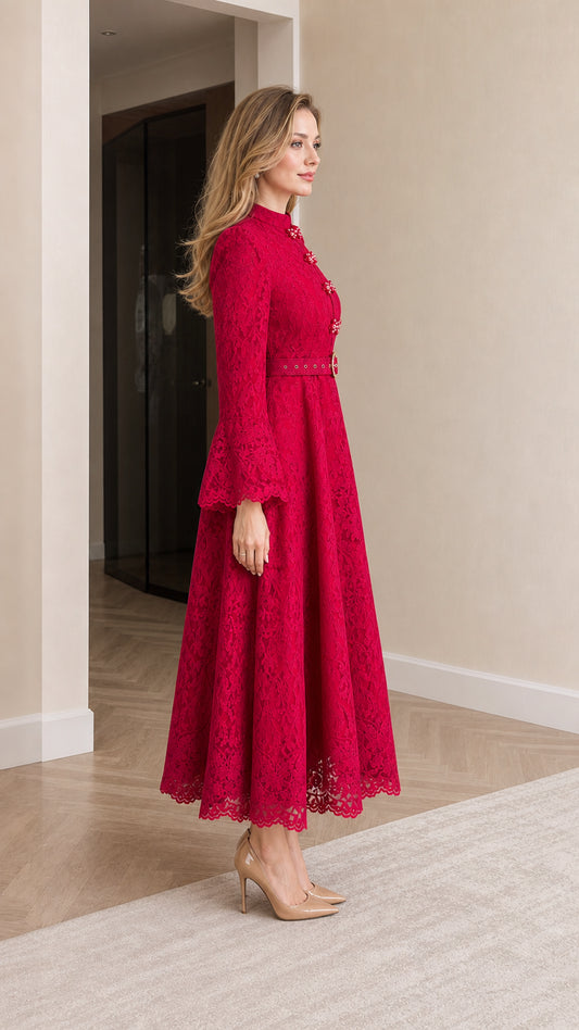 Side profile view of woman wearing red long sleeve lace evening maxi dress