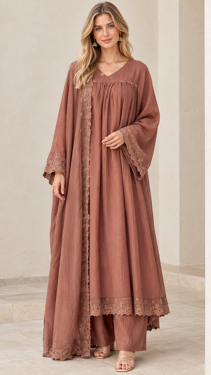 Front full-length view of model wearing dusty rose 3-piece abaya set with lace trim