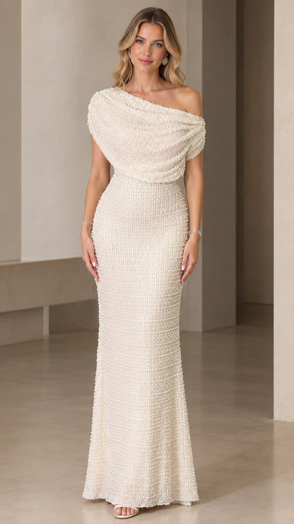 Front view of model wearing ivory pearl-embellished cowl neck column maxi gown