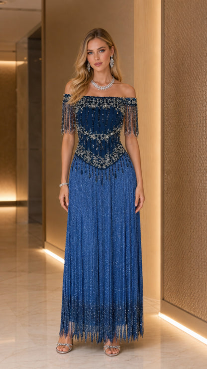 Front view of model wearing Royal Blue off-the-shoulder beaded fringe maxi evening dress