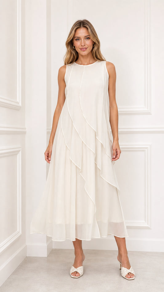 Front view of model wearing ivory sleeveless tiered chiffon midi dress