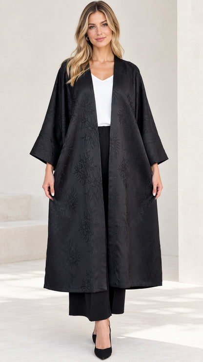 Full front view of women's black jacquard open-front duster coat with wide sleeves