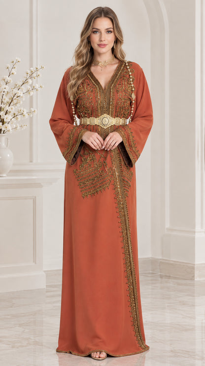 Front view of woman wearing a Rust embroidered Moroccan kaftan maxi dress with gold belt