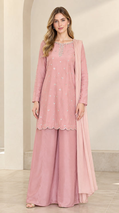 Front view of woman wearing dusty rose 3-piece embellished tunic and wide leg pants set with dupatta