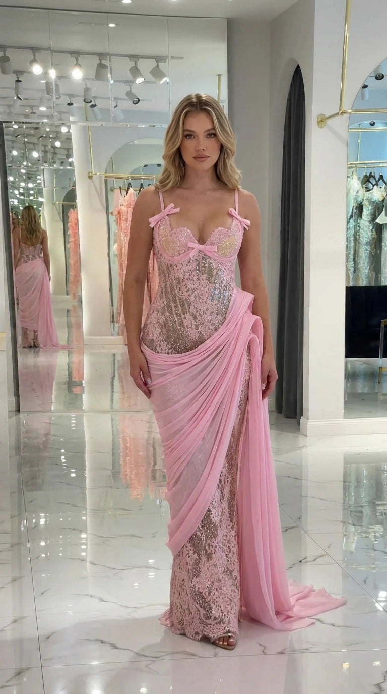 Front view of light pink sequin lace corset evening gown with draped sash