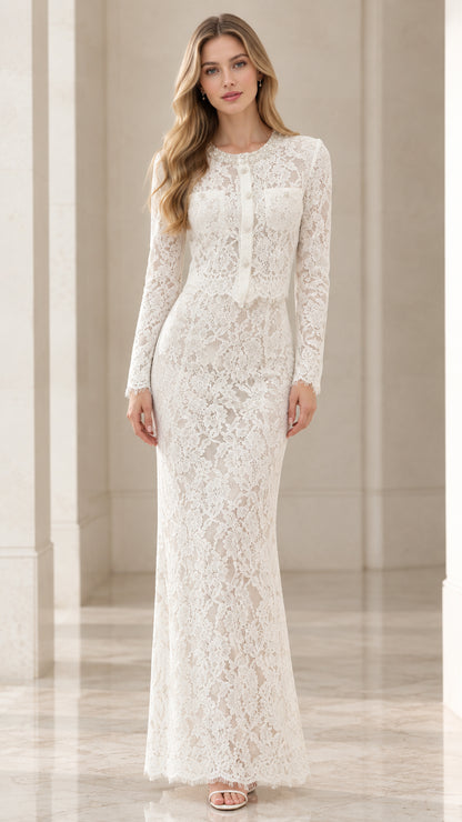 Front view of model wearing white long sleeve lace maxi dress with pearl details