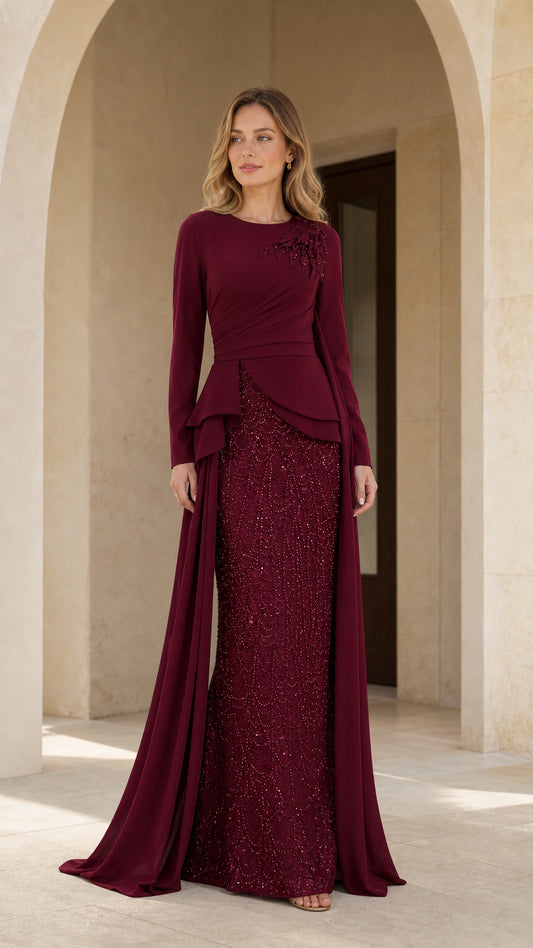 Burgundy long sleeve peplum formal gown with beaded shoulder and shimmer skirt - front view