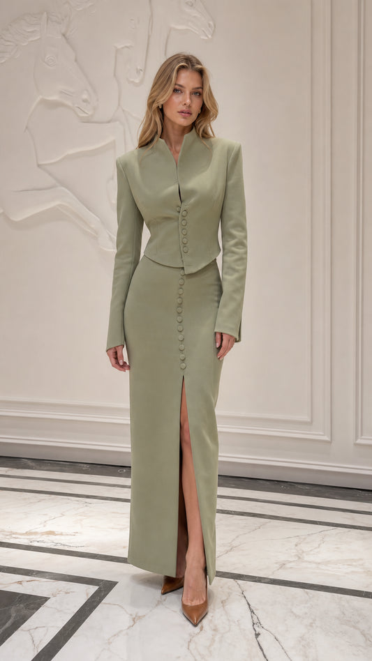 Front view of model wearing sage green stand collar jacket and maxi skirt set