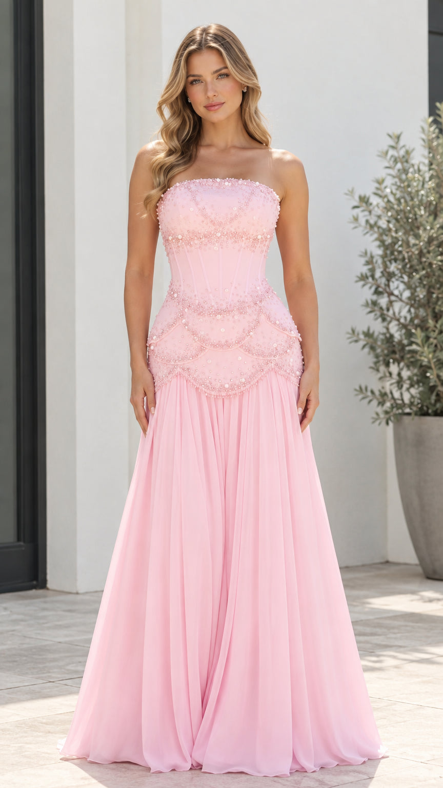Full front view of model wearing Light Pink strapless beaded corset chiffon evening gown