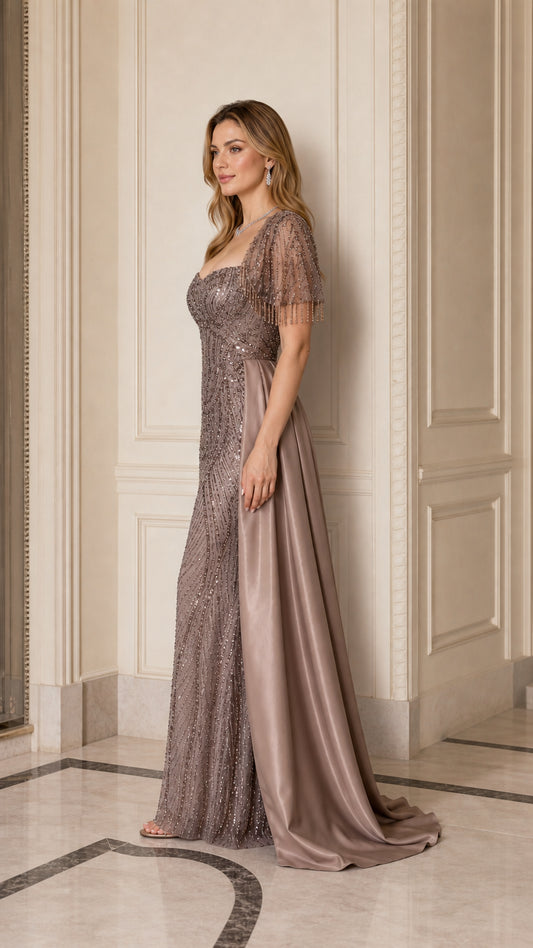 Taupe beaded formal dress with dramatic satin side train side profile