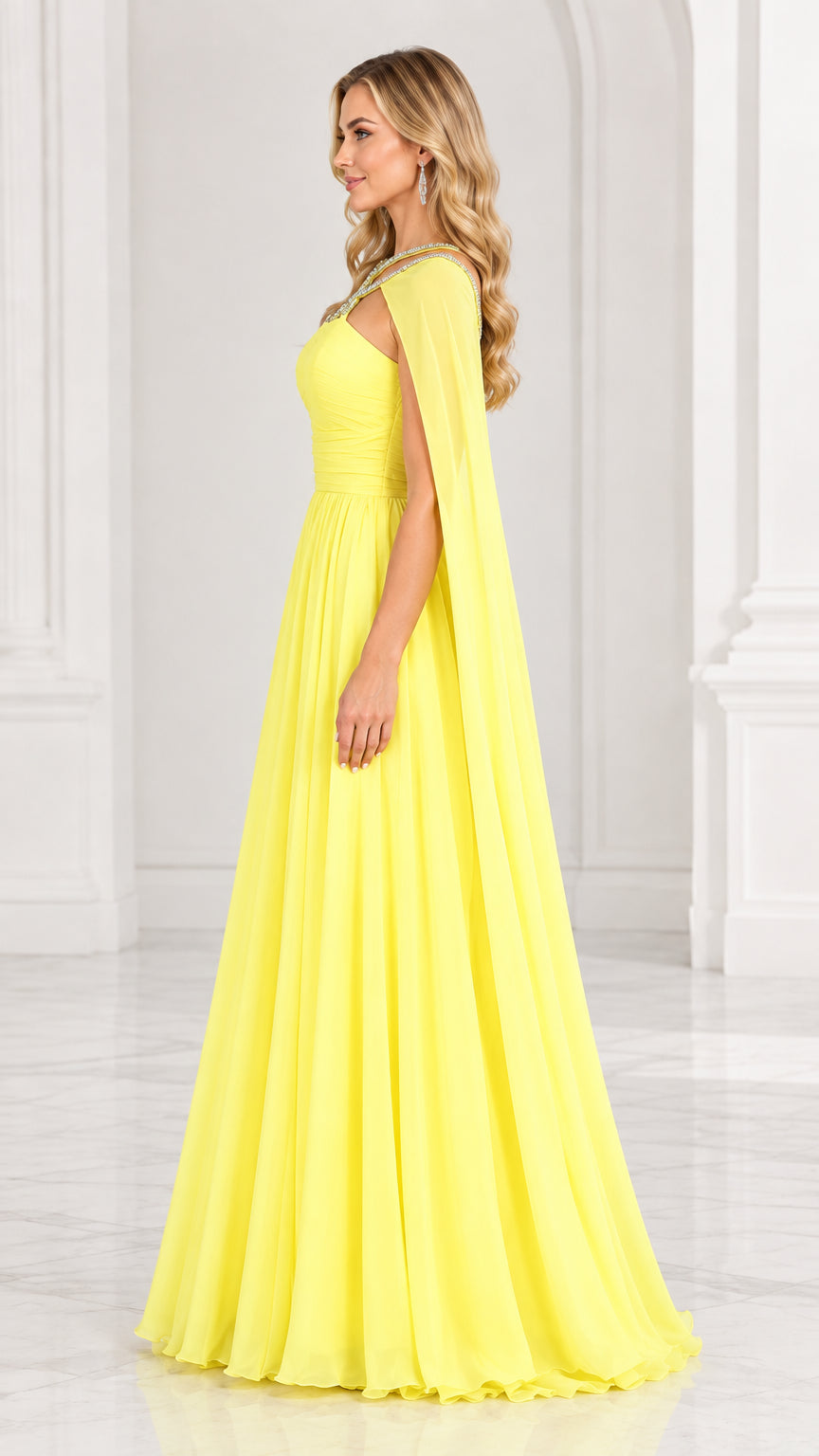 Side view of yellow formal gown showing dramatic drape of the attached cape