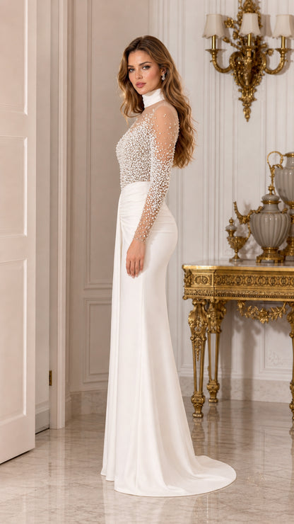 Side view of woman wearing white long sleeve pearl-embellished formal dress