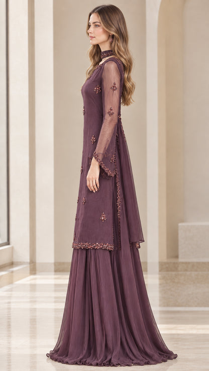 Side profile view of plum long-sleeve tunic and tiered wide-leg pants set