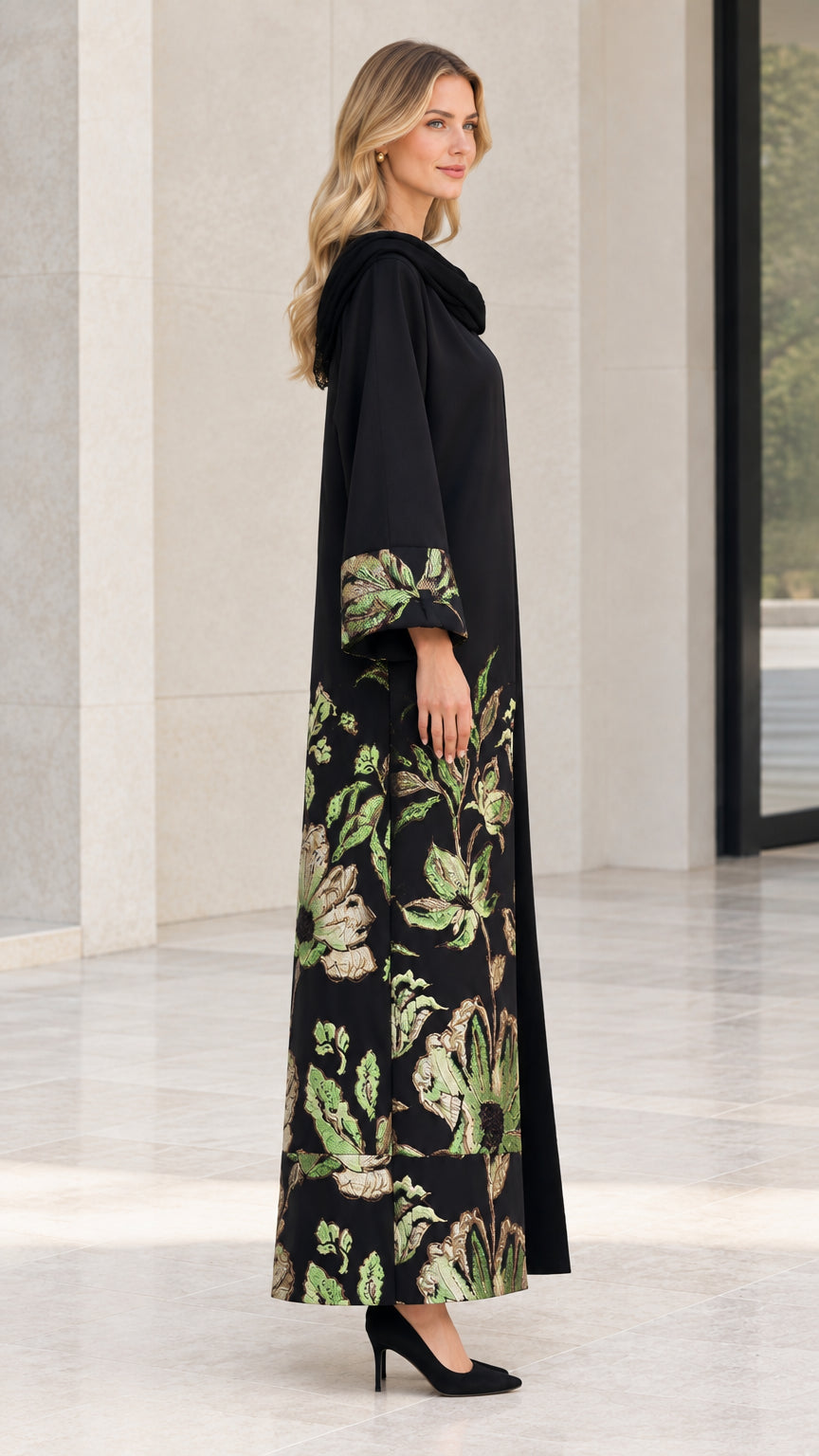 Side angle view of model in Black embroidered maxi abaya outfit