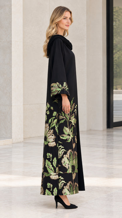 Side angle view of model in Black embroidered maxi abaya outfit