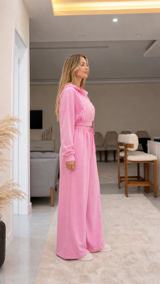 Side profile view of pink matching cropped hoodie and wide-leg lounge pants
