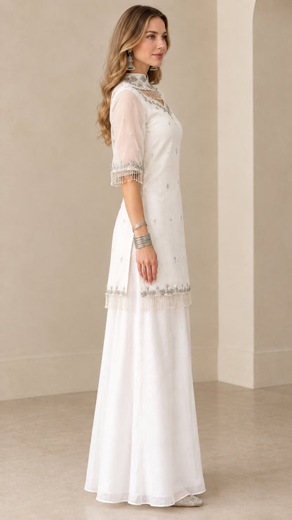 Side view of white kurti and flowing wide-leg sharara pants