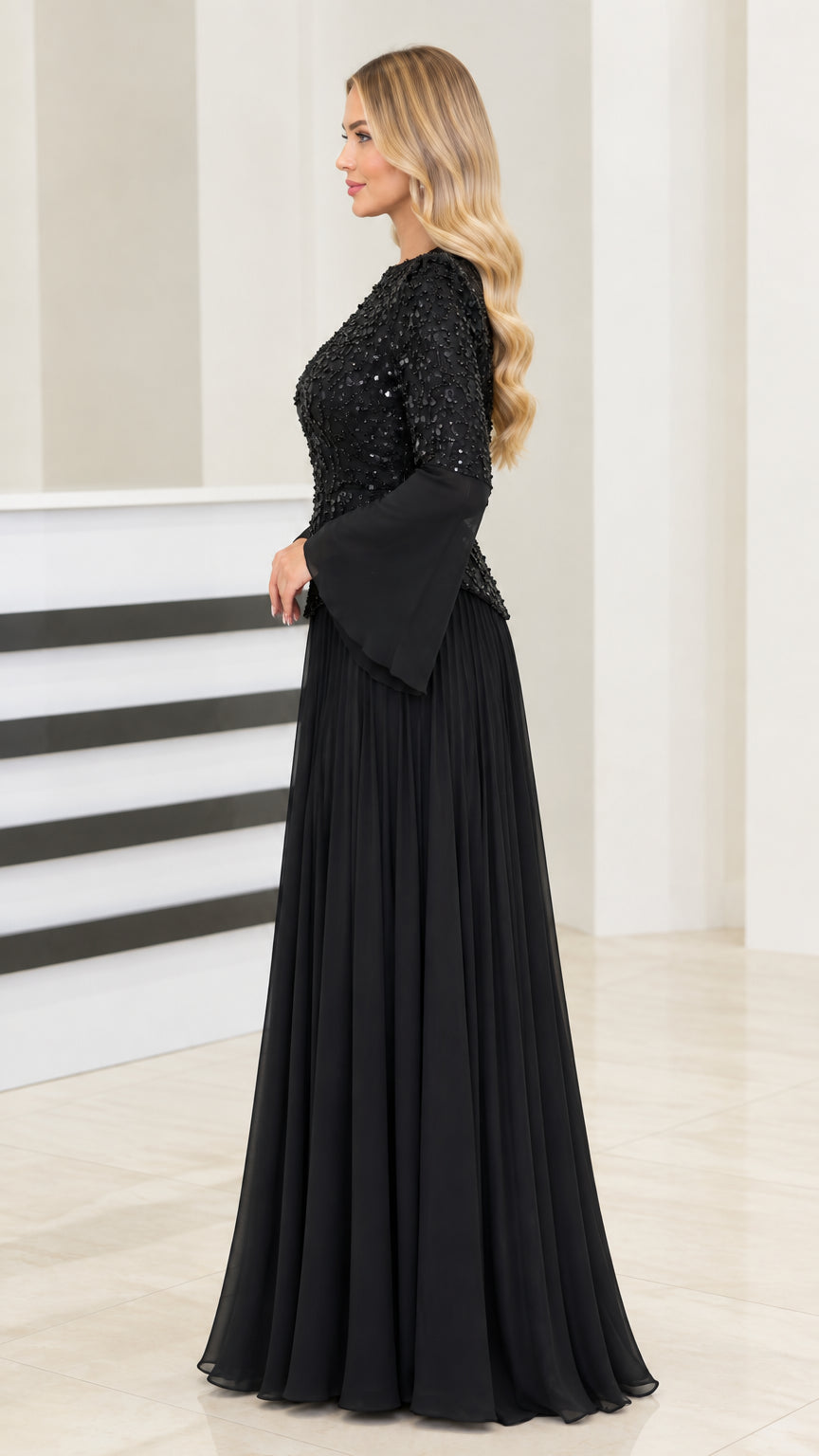 Side profile view of elegant black sequin and chiffon floor-length formal dress