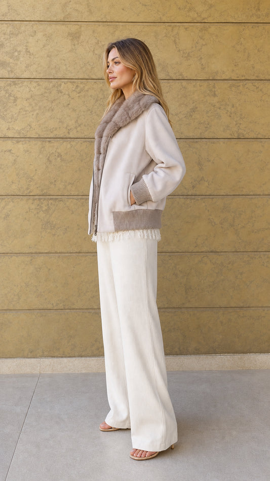 Side profile of cream faux-fur trimmed casual bomber jacket