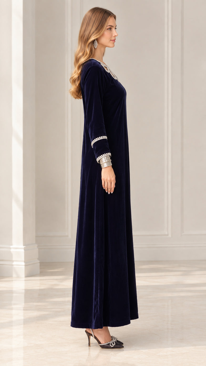Side view of Navy Blue velvet maxi dress showing sleek silhouette
