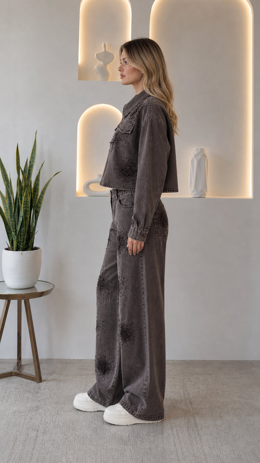 Side profile view of woman wearing washed grey rhinestone embellished denim co-ord set
