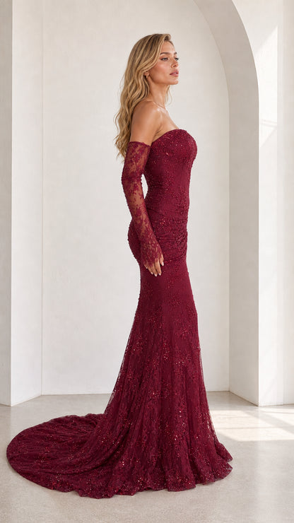 Side view of burgundy lace mermaid formal dress showing silhouette and sweep train