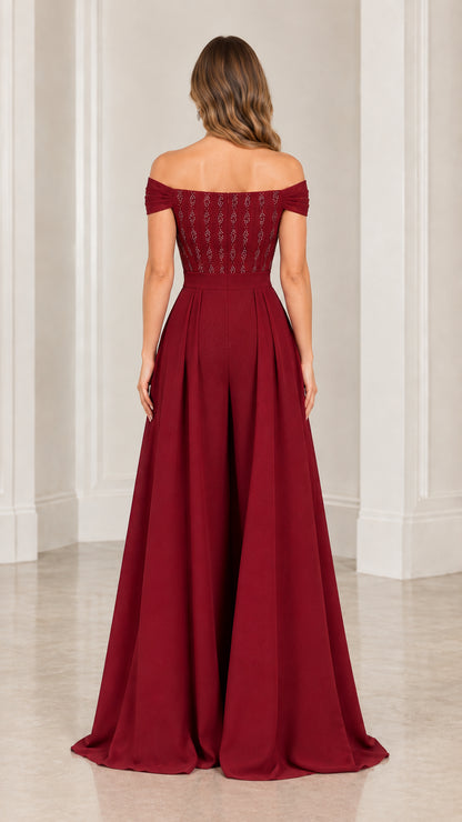 Back view of burgundy off-the-shoulder evening jumpsuit showing fit and flow