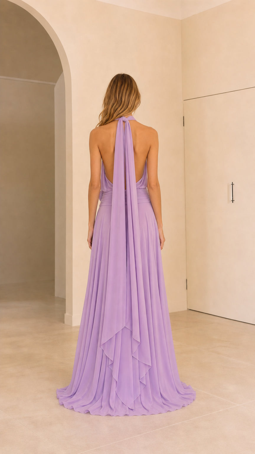 Back view of lavender halter evening dress featuring open back and cascading tie ties