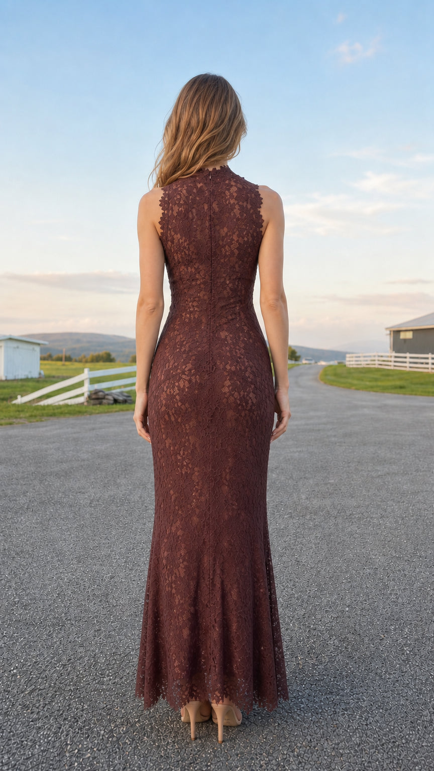 Back view of model showing sleek silhouette in burgundy lace maxi dress