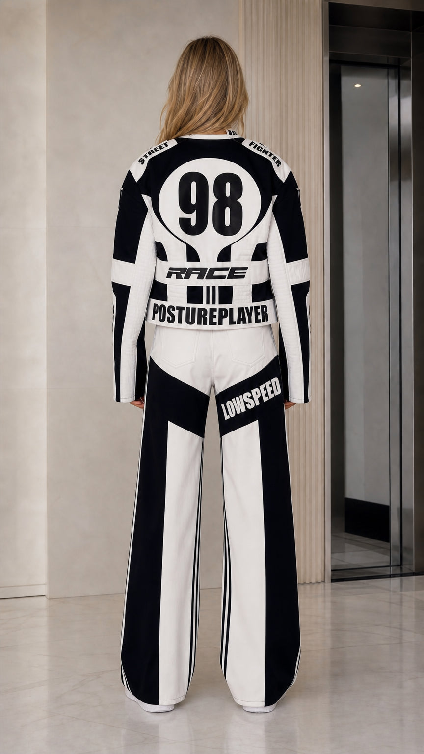 Back view of black and white graphic racer jacket and matching pants