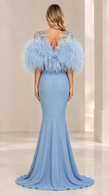 Back view of sky blue mermaid formal gown showing V-back design and train