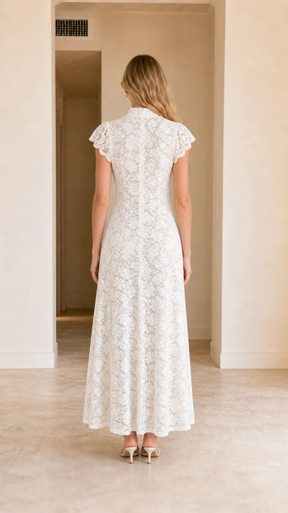 Back view of model wearing floor-length white lace formal dress