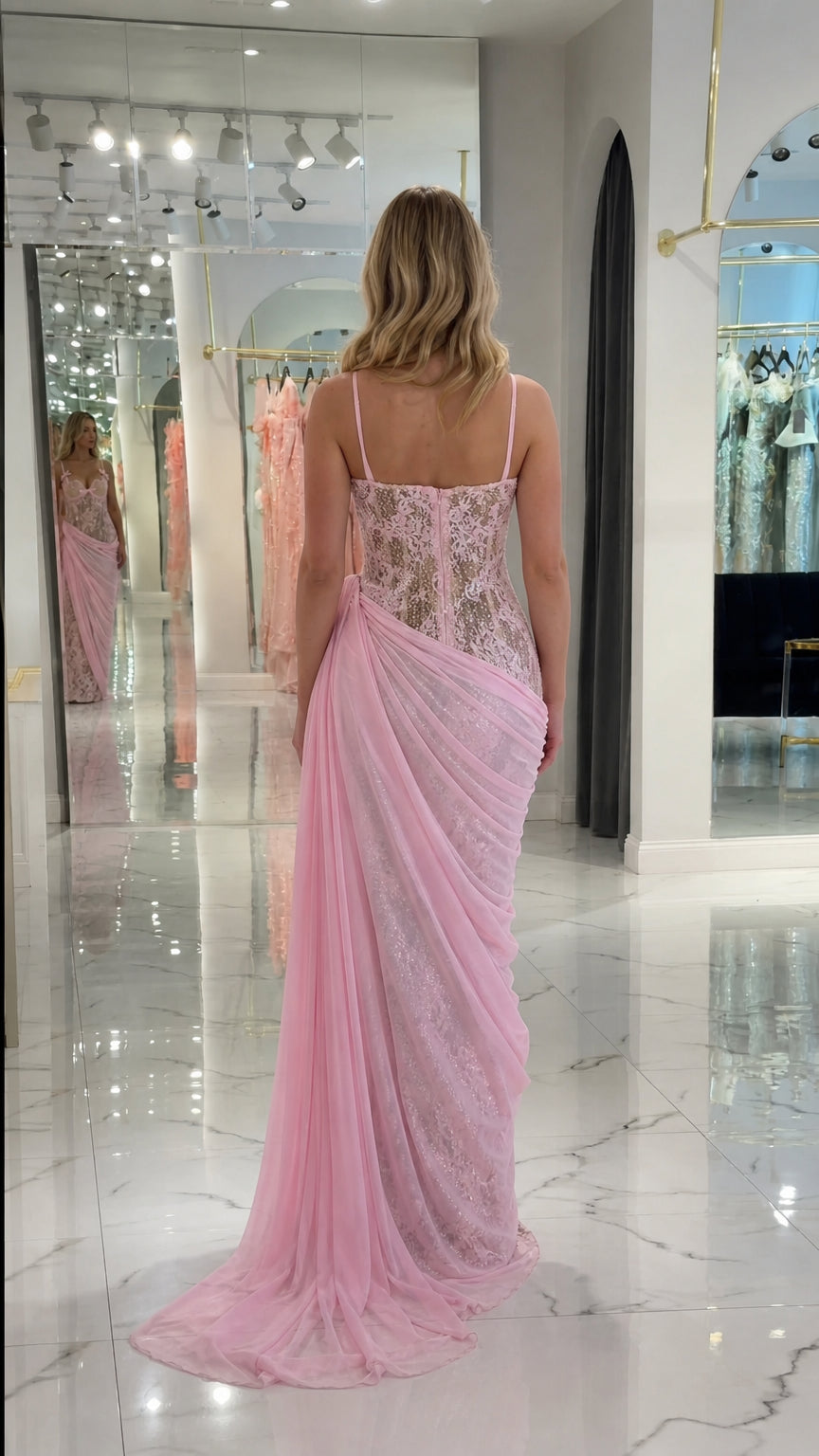 Back view of light pink bustier evening gown with sheer corset back