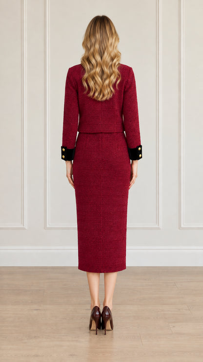 Back view of model showing the clean tailored fit of burgundy tweed skirt suit set