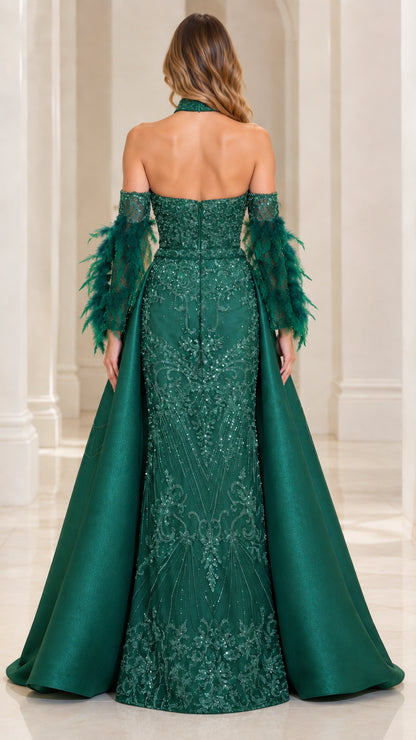Back view of Emerald Green evening gown showing open back design and flowing satin train