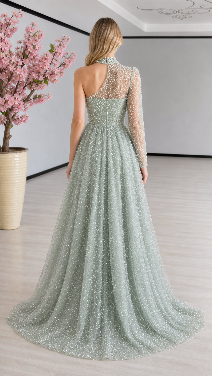 Back view of sage green one-shoulder evening gown showing keyhole and sweep train