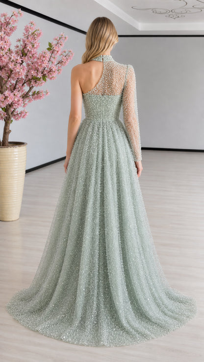 Back view of sage green one-shoulder evening gown showing keyhole and sweep train