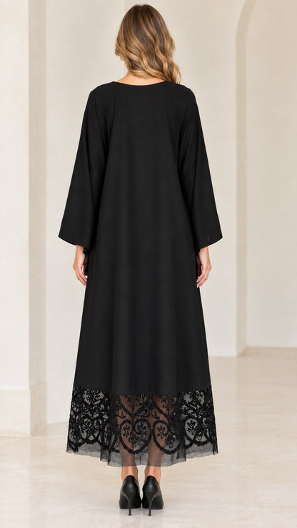 Back view of black floor-length maxi dress and overlay set