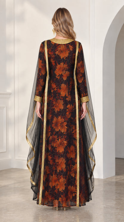 Back view of model in black floral maxi kaftan showcasing flowing sheer overlay