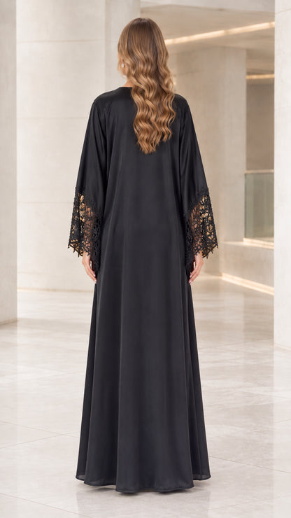 Back view of the black floor-length satin duster robe and evening gown