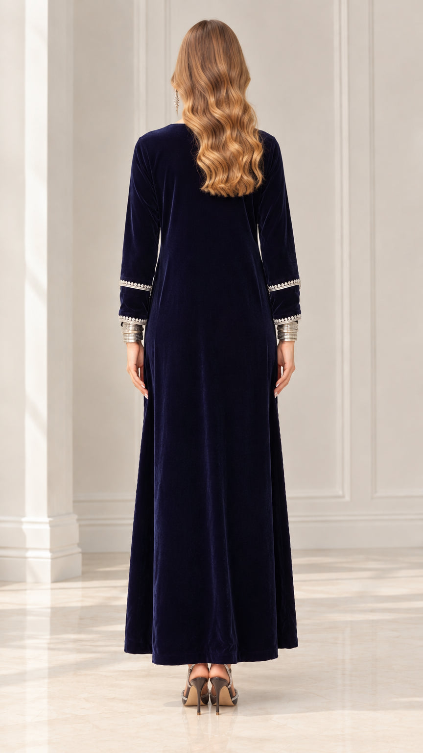 Back view of model wearing Navy Blue long sleeve velvet maxi dress