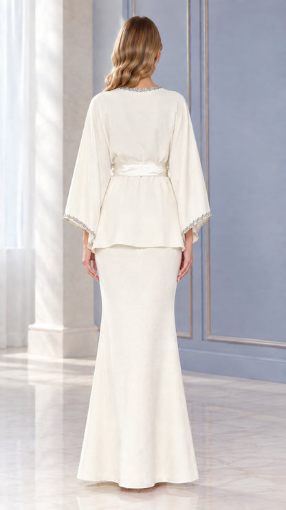 Back view of Ivory two-piece evening set showing drape and fit