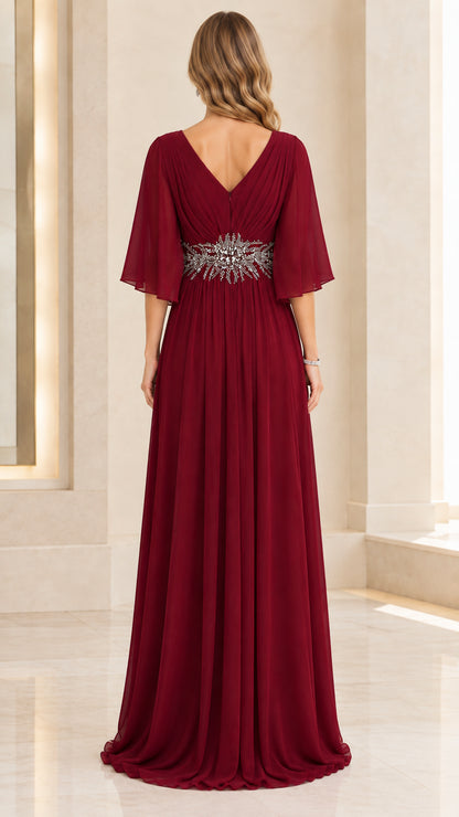 Back view of burgundy V-neck evening gown featuring elegant back neckline and concealed zipper