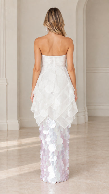 Back view of model in white strapless organza paillette maxi gown