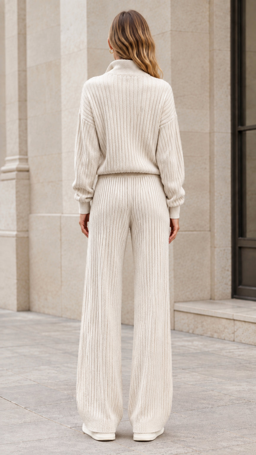 Back view of woman modeling the cream ribbed knit lounge set