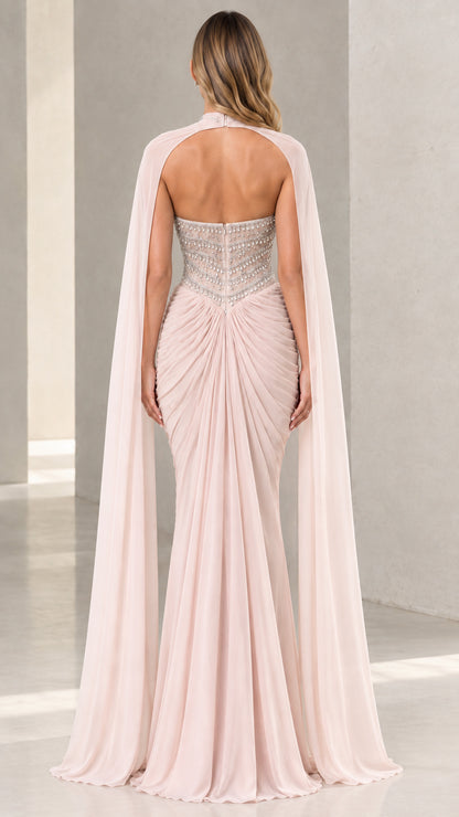 Back view of Blush Pink cape evening gown showing open back and ruched detail