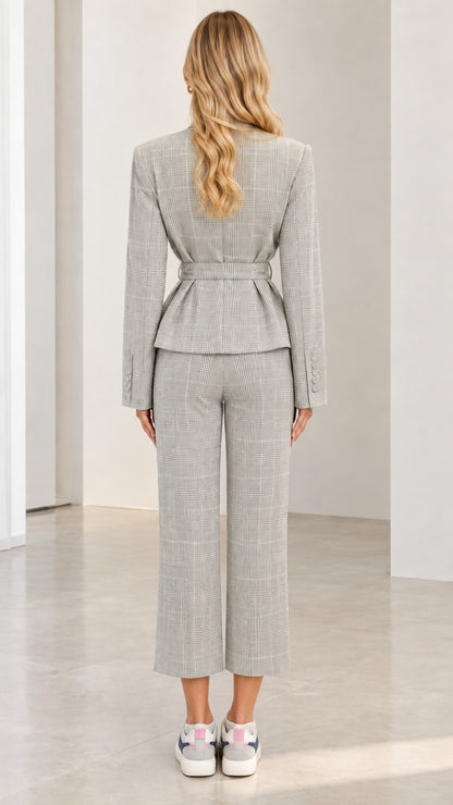 Back view of Light Grey plaid tailored peplum jacket and trousers