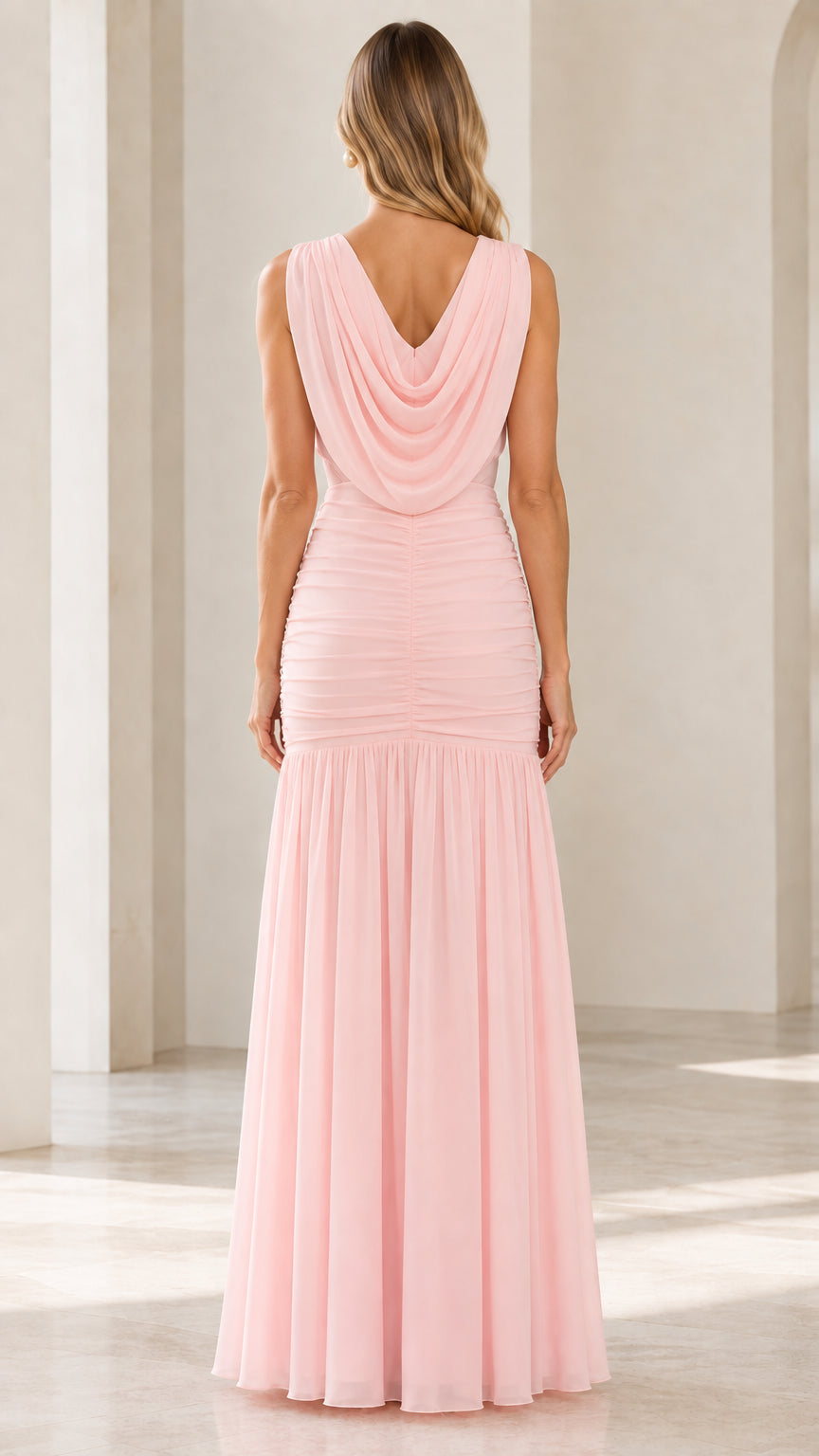 Back view of blush pink maxi dress highlighting the draped open cowl neckline