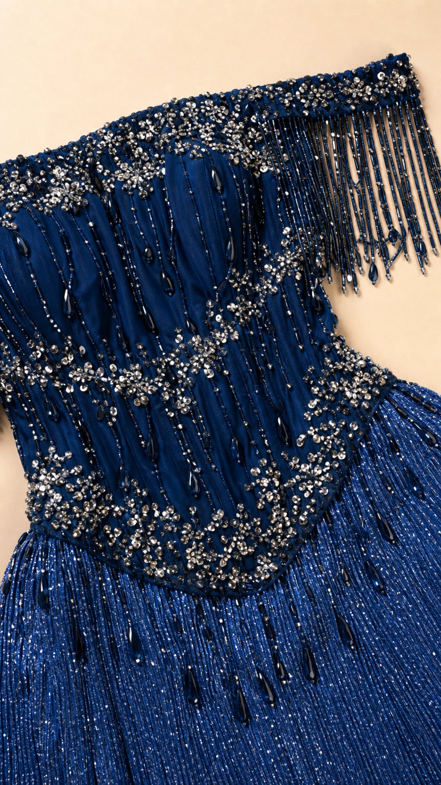 Close-up detail of Royal Blue sequined bodice and hanging beaded fringe