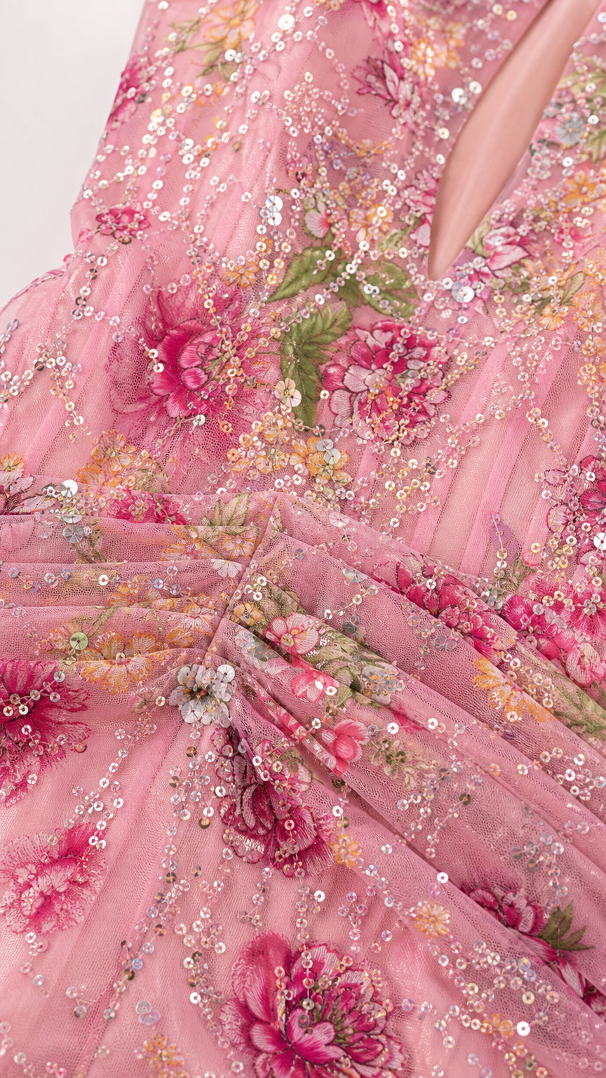 Close-up detail of floral embroidery and sequin embellishments